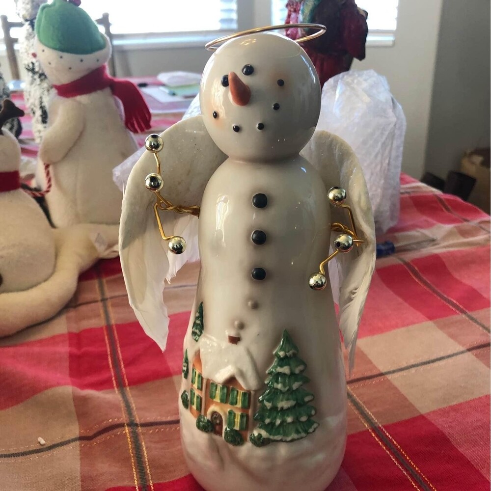 Adorable ceramic snowman angel 9 inches tall real feather wings n￼